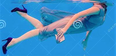 surreal-art-portrait-young-woman-underwater-swimming-pool-grey-dress-beaded-scarf-small-bag-violet-high-heels-111021622.jpg